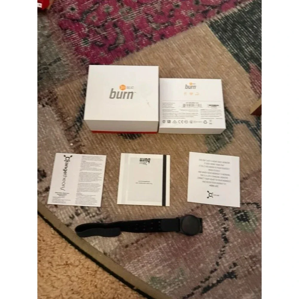 Orange theory heart monitor and box